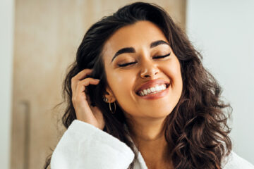 Smiling girl with healthy teeth after getting dental fillings in Whitby, ON.