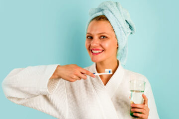 Smiling girl ready for regular teeth cleaning as advised by our dentist in Whitby.