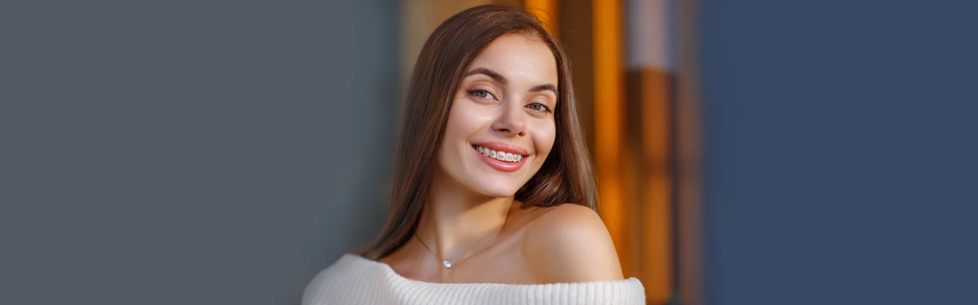 Beautiful smiling girl with dental braces in Whitby, ON.