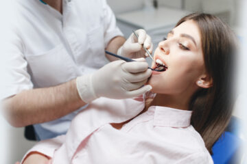 Girl undergoing dental check up and cleaning at a Whitby dental clinic.